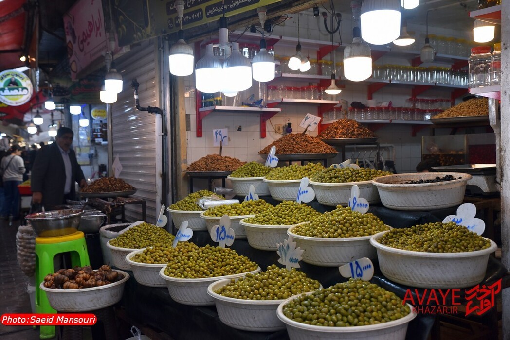 گوشه‌هایی از بازار سنتی رشت و میدان شهرداری در یک روز سرد بهاری