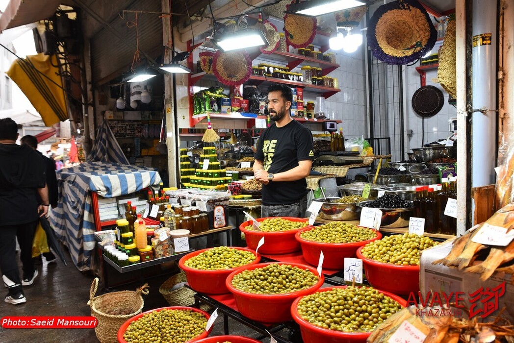 گوشه‌هایی از بازار سنتی رشت و میدان شهرداری در یک روز سرد بهاری