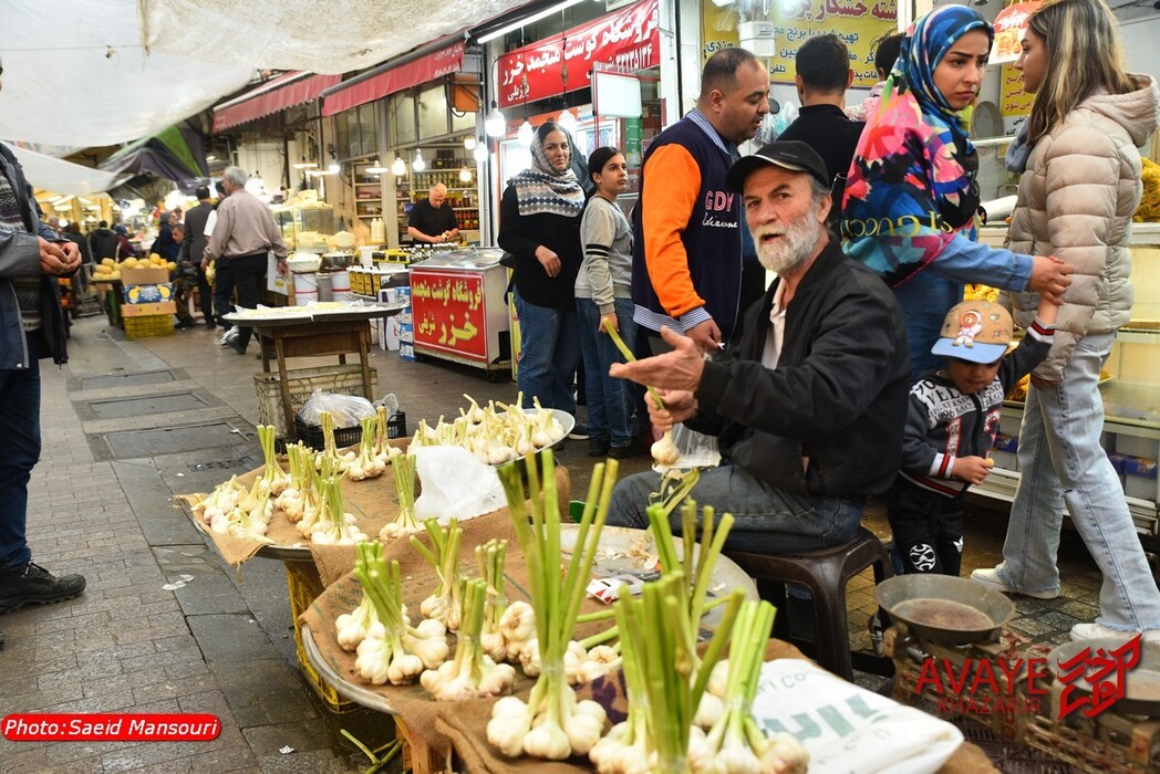 گوشه‌هایی از بازار سنتی رشت و میدان شهرداری در یک روز سرد بهاری